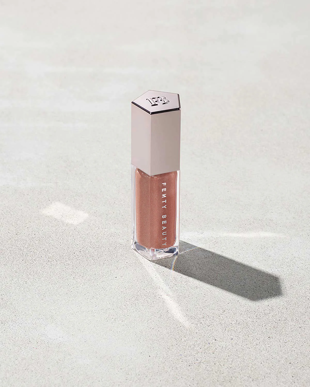 FENTY BEAUTY GLOSS BOMB – UNIVERSAL LIP LUMINIZER FENTY GLOW 01